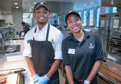 Two culinary students posing