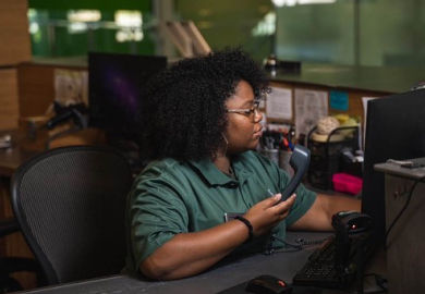 Student Center Representative making a phonecall